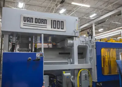 The 1000 Ton Van Dorn equipment for injection molding in Sterling Heights, Michigan is shown here.