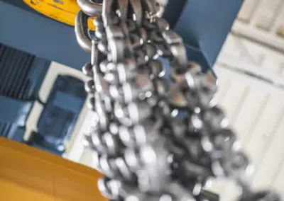 An artistic image of an overhead chain is shown here.