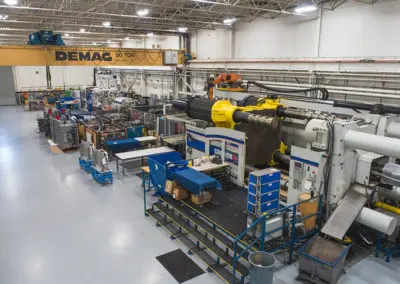 Located in Macomb County, Plastic Molding Development offers a friendly atmosphere in a clean workspace. Our 3300 Ton Van Dorn is shown here with the 1700 Ton Wittmann Battenfeld in the background.
