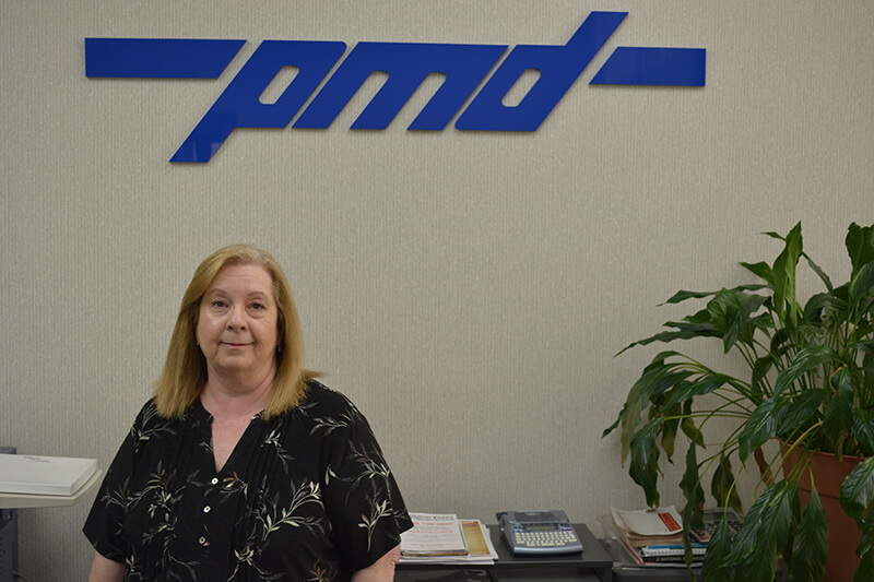 The Plastic Molding Development Management Team includes Office Manager Joy Dennison.